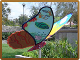 Each piece of the butterfly sculpture has a different color/design